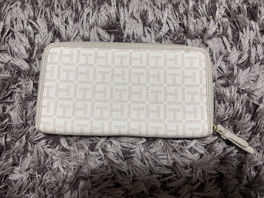 Tommy Hilfiger Monogram Zip-around Wallet (Pink/Beige) (Category: Wallets & Card holders) located in Quezon City. Submitted by jjccly (Listing ID 1464656168, Image 2). Description: brand new condi never used got as a gift from the US last year minor flaw: see last pic.