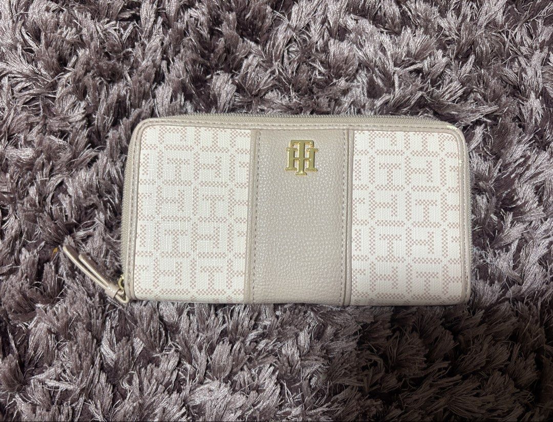 Tommy Hilfiger Monogram Zip-around Wallet (Pink/Beige) (Category: Wallets & Card holders) located in Quezon City. Submitted by jjccly (Listing ID 1464656168, Image 1). Description: brand new condi never used got as a gift from the US last year minor flaw: see last pic.