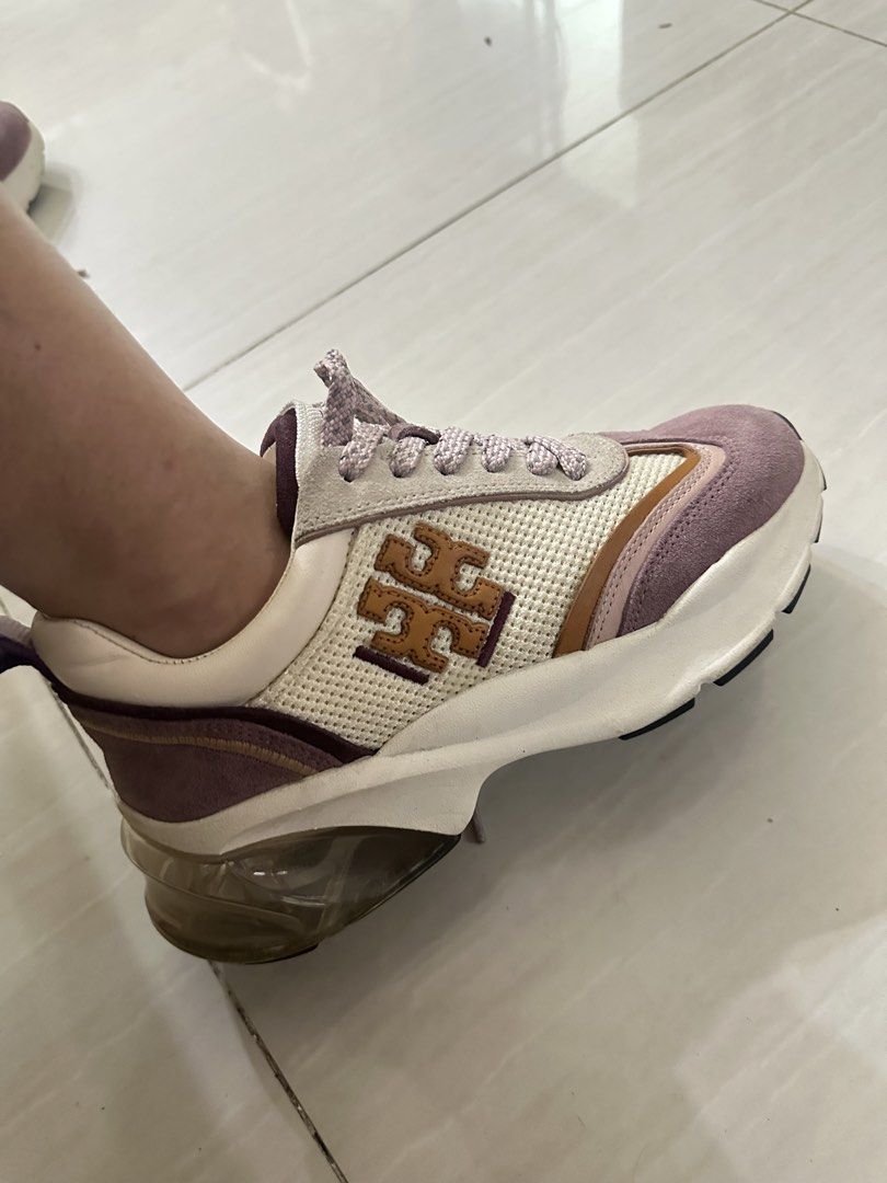 Tory Burch sneakers (Category: Sneakers) located in Bulacan. Submitted by louiseee23 (Listing ID 1464639994, Image 1). Description: - Brand: Tory Burch - Color: Cream, Purple, Brown - Style: Lace-up sneakers - Features: Signature Tory Burch logo on the side, chunky sole, unique clear heel detail - Perfect for: Casual wear.
