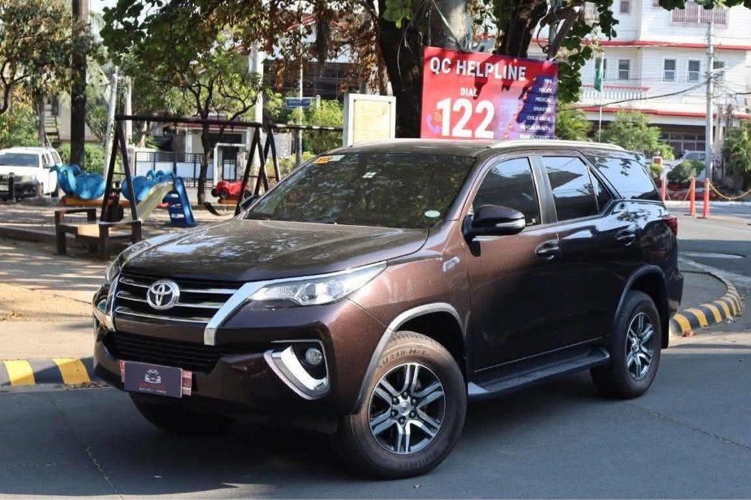 Toyota Fortuner G Auto (Category: Used Cars) located in Manila. Submitted by quality_cars (Listing ID 1464638613, Image 3). Description: 2017 Toyota Fortuner G Phantom Brown Metallic 2.4L Diesel Engine Automatic Transmission 52K Original Milage 8 Ending (Thursday Coding) Registered 2026 LED Headlight and Foglights Premium Leather Seat Cover Brand New Tires Front and Rear Dashcam New Oil and ATF 928K nego upon viewing 📍QC Banawe Viewing.