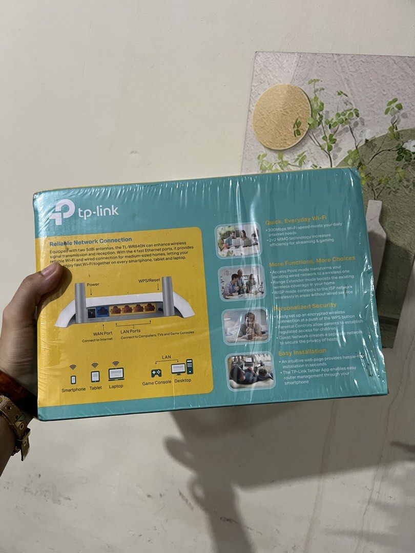 TP-Link TL-WR840N 300Mbps Wireless N Router (Category: Networking) located in Manila. Submitted by Pilarrrrr (Listing ID 1464740196, Image 2). Description: - Model: TP-Link TL-WR840N (300Mbps Wireless N Router) - Color: White with two 5dBi antennas - Ports: 4 fast Ethernet ports and 1 WAN port - Modes: Supports Router, Access Point, Range Extender, and WISP modes - Setup: Easy configuration via web interface or Tether app - Inclusions: Original b