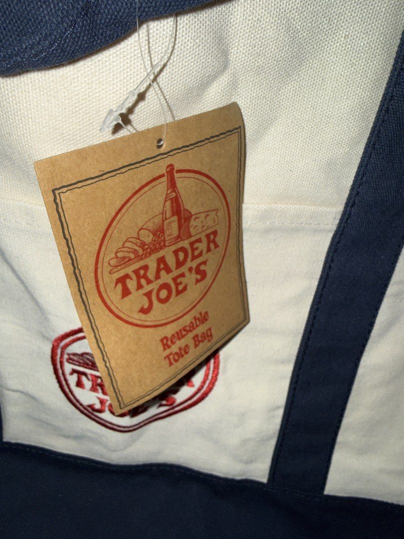 Trader Joe's Reusable Canvas Tote Bag (Category: Tote Bags) located in Quezon City. Submitted by olrac23 (Listing ID 1464642327, Image 3). Description: - Trader Joe's Reusable Tote Bag - Material: 65% Cotton, 35% Polyester - Versatile Use: Groceries, beach trips, book bag - Care Instructions: Machine wash cold with like colors - Drying: Lay flat to dry (expect slight shrinkage) - Origin: Made in Vietnam.