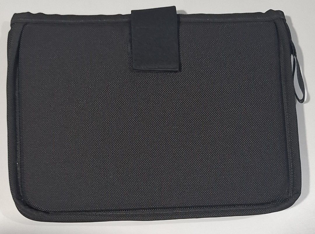 Tumi Black Nylon Laptop Sleeve (Category: Laptop Bags & Sleeves) located in Makati City. Submitted by decluttermp (Listing ID 1464606311, Image 3). Description: - Brand: TUMI - Color: Black - Material: Nylon - Dimensions: L - in x W - x D - - Features: Front pocket, strap closure - Compatibility: Fits 13 inch MacBook Air - Function: Protects your device - Design: Clean and simple.
