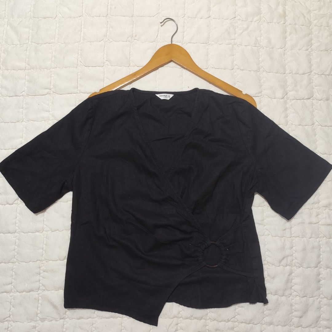 Twenty4Woman black wrap top (Category: Blouses) located in Bacolod City. Submitted by dearicawho.56 (Listing ID 1464708444, Image 1). Description: - Brand/Model: Twenty4 Woman - Color: Black - Size: UK 12 - Style: Wrap front design with side ring detail - V-neckline 🧾Mode of payment: 💙Gcash 💚GoTyme 🖤Maya 📍 Bacolod City. Negros Occidental .