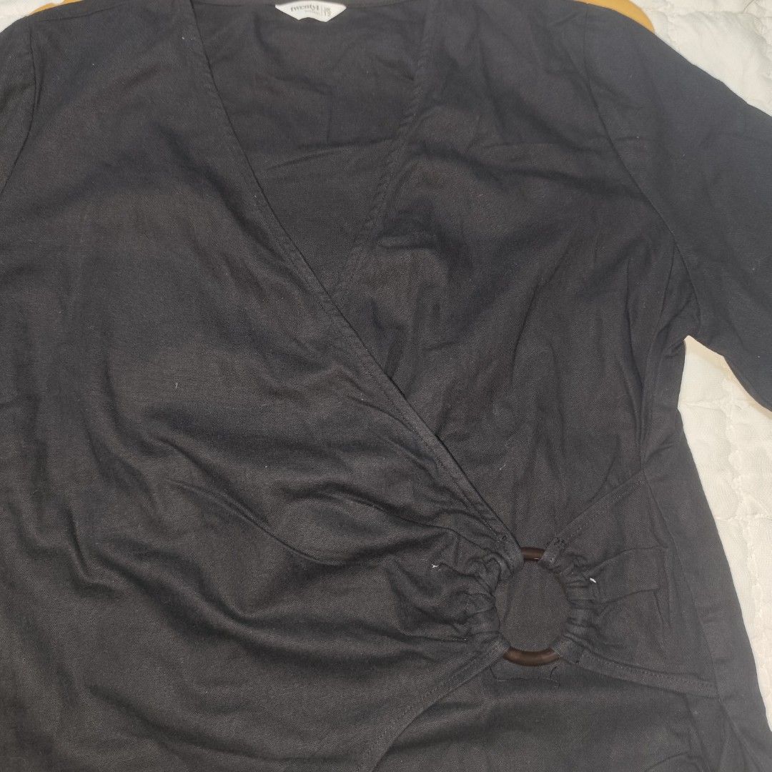 Twenty4Woman black wrap top (Category: Blouses) located in Bacolod City. Submitted by dearicawho.56 (Listing ID 1464708444, Image 2). Description: - Brand/Model: Twenty4 Woman - Color: Black - Size: UK 12 - Style: Wrap front design with side ring detail - V-neckline 🧾Mode of payment: 💙Gcash 💚GoTyme 🖤Maya 📍 Bacolod City. Negros Occidental .