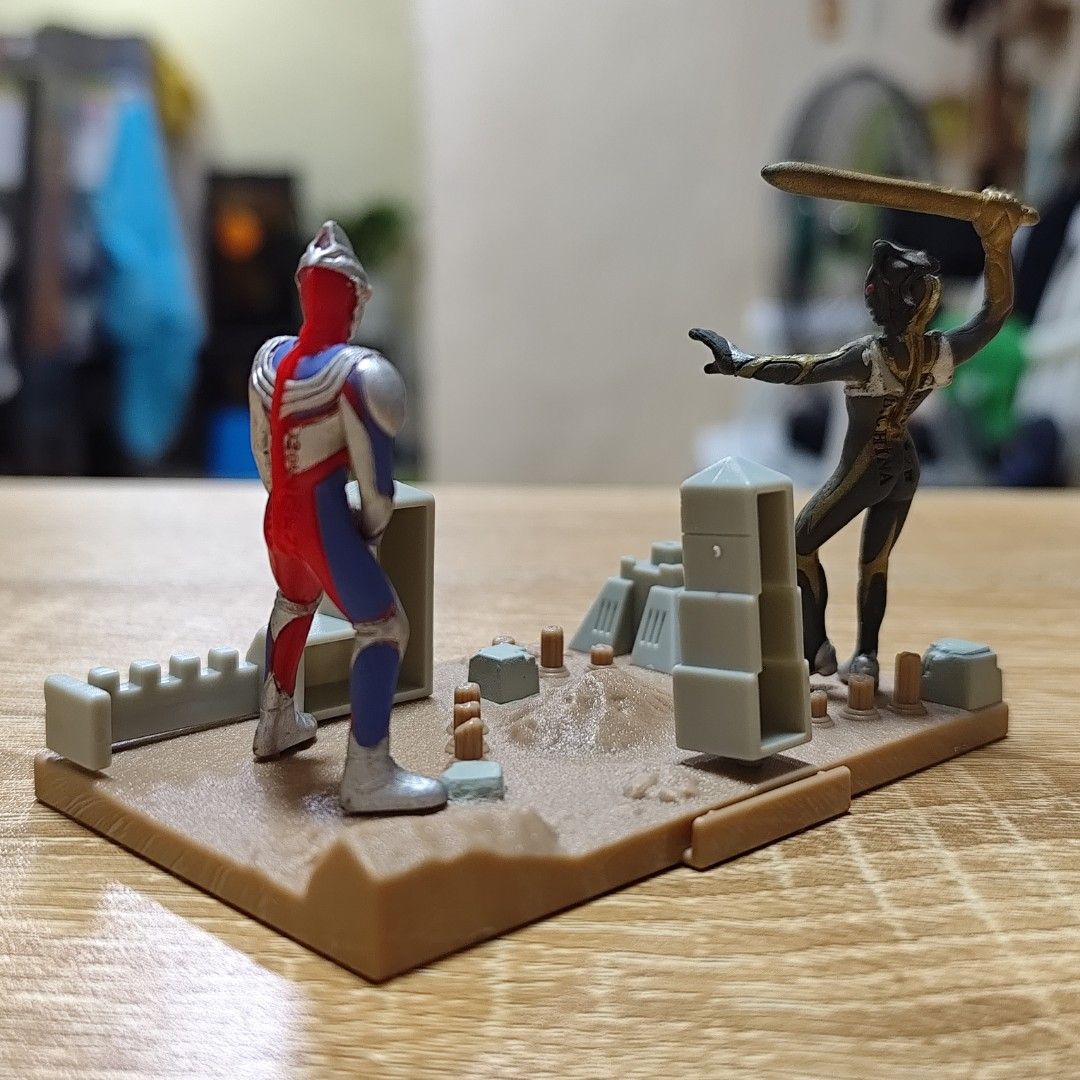 Ultraman Diorama Figure Set (Category: Figurines & Statues) located in Rizal. Submitted by mamamamawskey_031284 (Listing ID 1464572054, Image 3). Description: FREE Ultraman bottle cap figure - see last photo - Ultraman diorama set - Features a dynamic battle scene base - Includes miniature buildings and desert ruins - Highly detailed and painted figures - Ideal for collectors and fans - Great display piece.