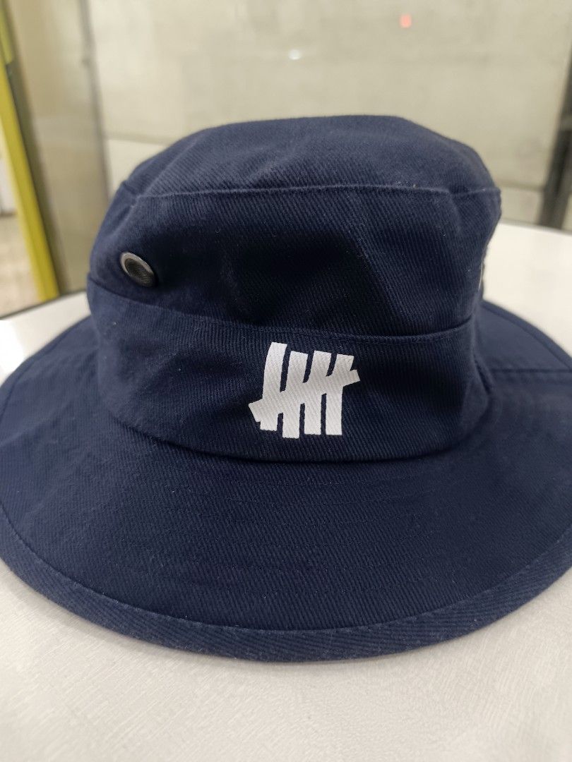 Undefeated Bucket Hat (Category: Caps & Hats) located in Tacloban City. Submitted by agnescthrifted98 (Listing ID 1464578475, Image 1). Description: Slightly used from Ukay Source no major issue ang ganda small size on tag only but not kid.