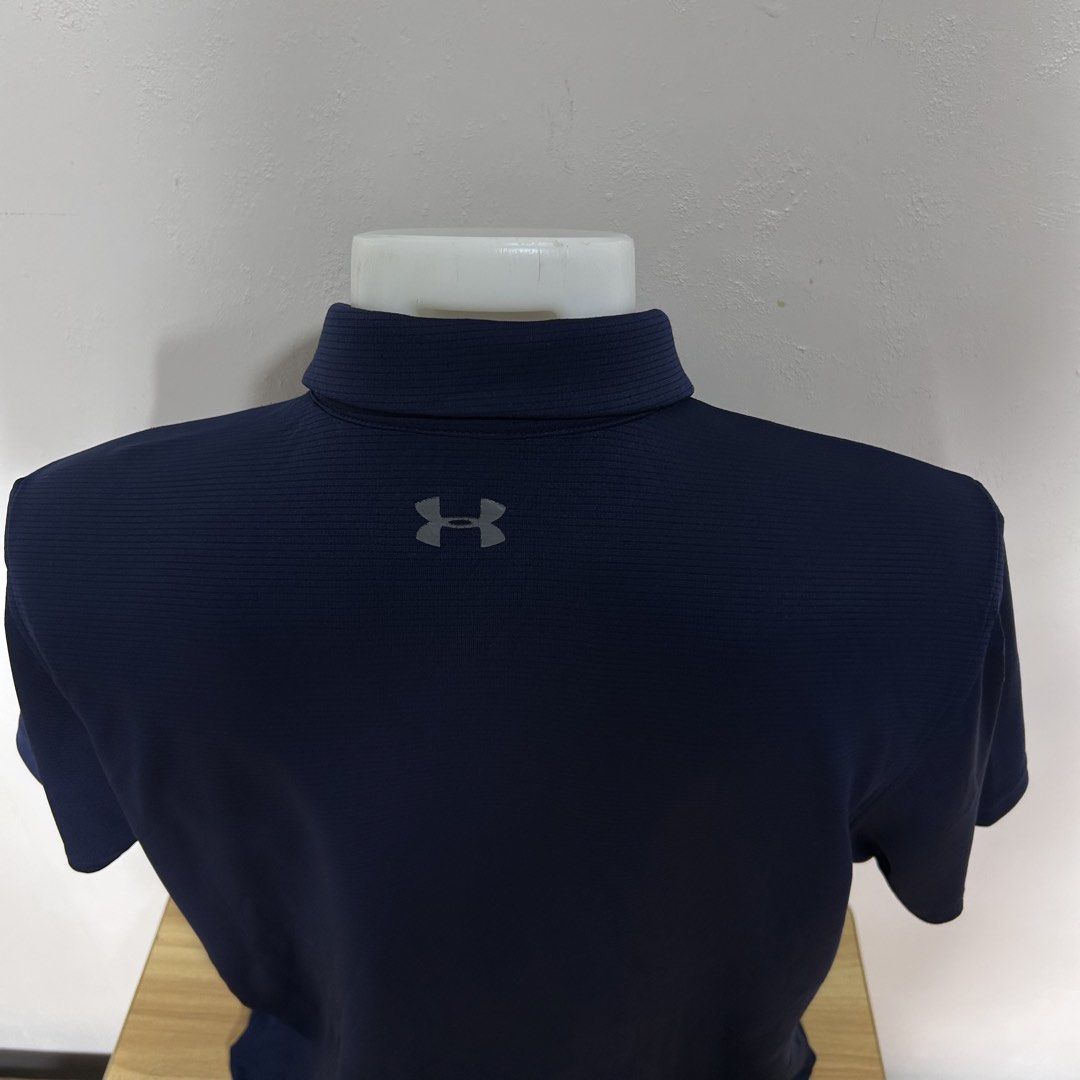 Under Armour Navy Blue Polo Shirt (Category: Tshirts & Polo Shirts ) located in Dipolog. Submitted by edthrfts (Listing ID 1464707867, Image 2). Description: ✅ ALREADY WASHED AND SANITIZED 📐Width: 22.5 📐Length: 26.5 Fit to: XL-2XL Condition: 9.5/10 Color: 9.8/10 Issue: fade print sa front and minimal hairline sa back.