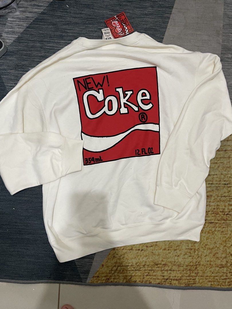 Uniqlo Coca-Cola Sweatshirt brand new with tag (Category: Coats, Jackets and Outerwear) located in Marikina City. Submitted by caseydreyes (Listing ID 1464598243, Image 1). Description: - with tags - brand new/never been used - rfs: impulse buy.