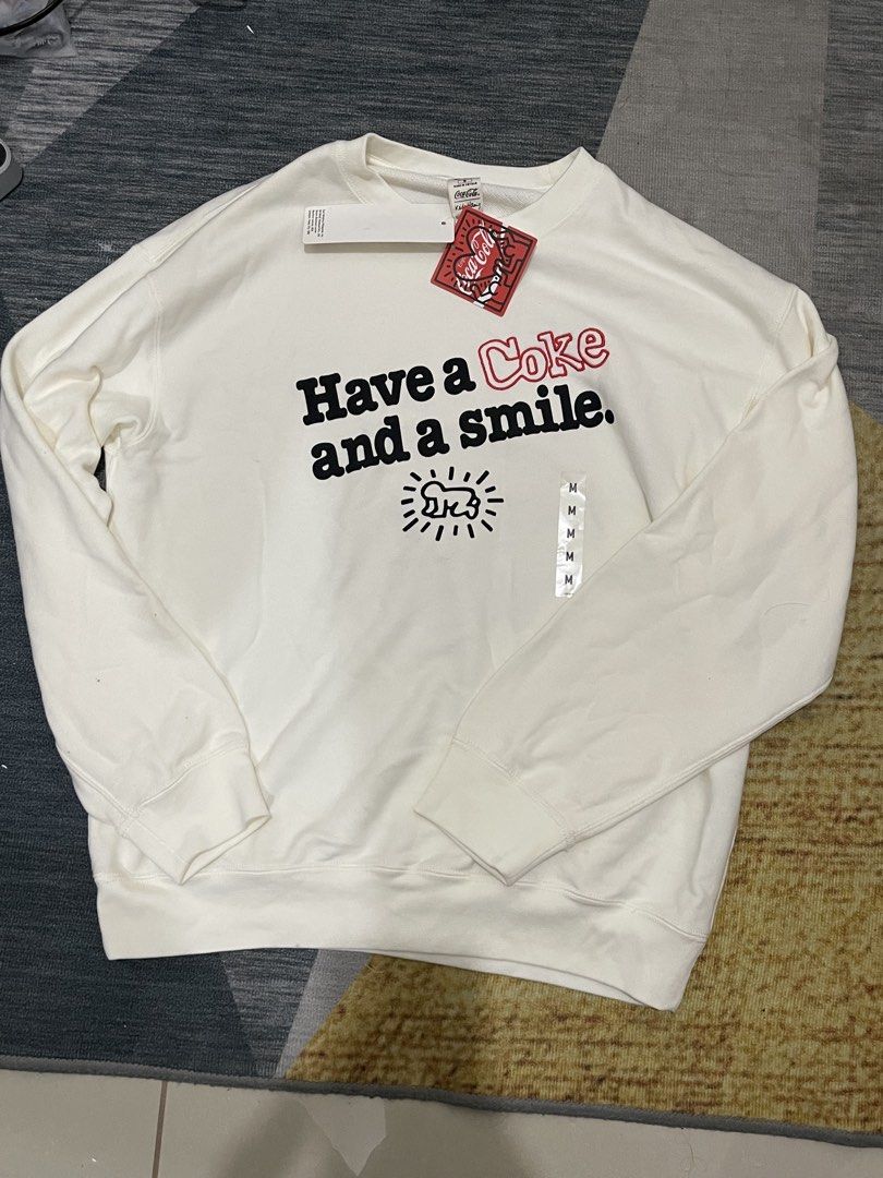 Uniqlo Coca-Cola Sweatshirt brand new with tag (Category: Coats, Jackets and Outerwear) located in Marikina City. Submitted by caseydreyes (Listing ID 1464598243, Image 2). Description: - with tags - brand new/never been used - rfs: impulse buy.