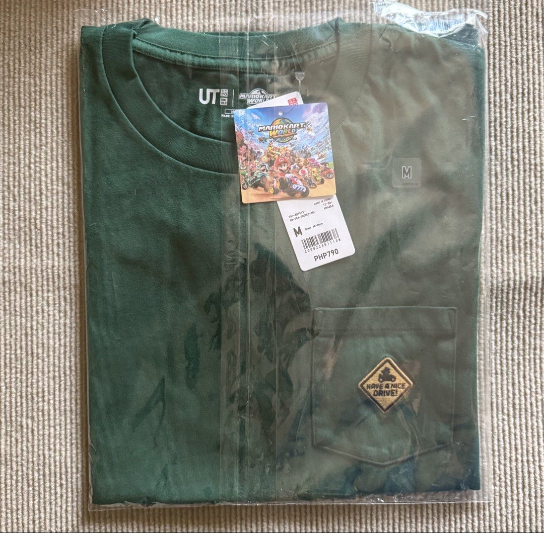 Uniqlo Mario Kart World UT MEDIUM (Category: Tshirts & Polo Shirts ) located in Marikina City. Submitted by wearism (Listing ID 1464699585, Image 3). Description: 100% brand new with tag and original Uniqlo. AVAILABLE UNTIL POSTED. LAST PRICE POSTED. Size: Medium Fit: Regular. Unisex. Color: Dark Green 58 No when worn photo(s). Location: Santo Niño, Marikina Shipping via J&T. GOtyme/BDO payment..