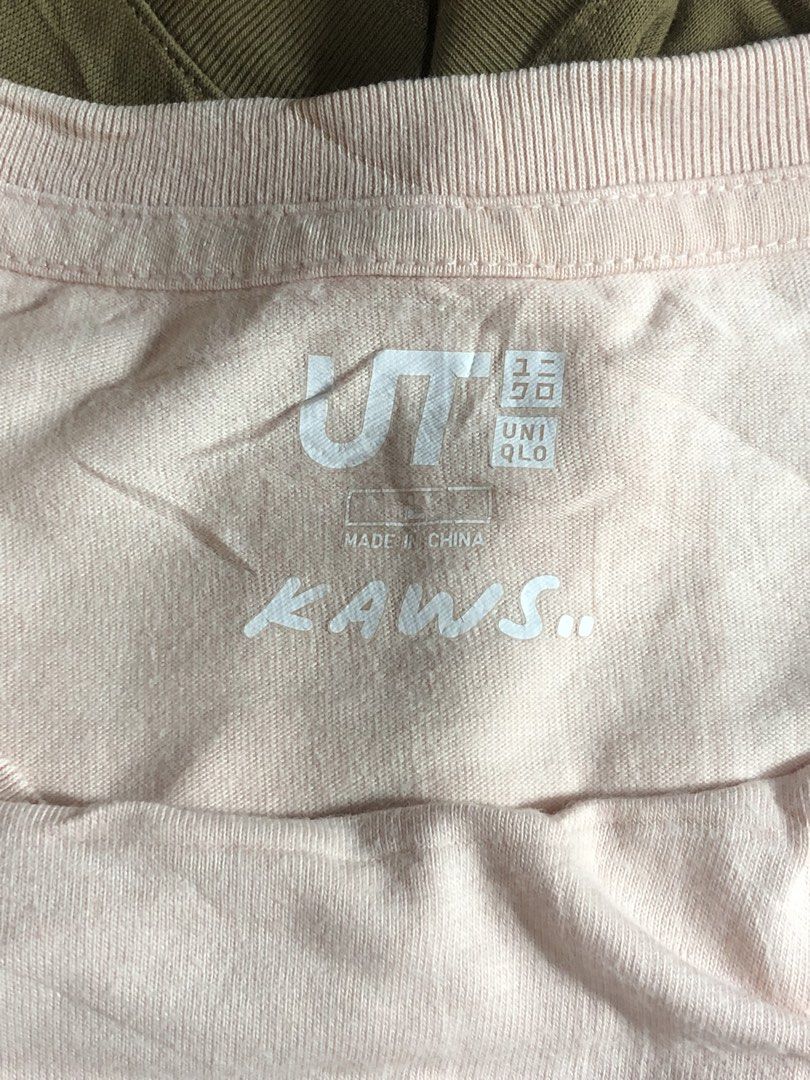 Uniqlo UT KAWS Pink Graphic Tee (Category: Shirts) located in Montevista. Submitted by rdthriftshub (Listing ID 1464756281, Image 2). Description: - Authentic Uniqlo UT x KAWS collaboration piece - Color: Pale pink with iconic front Companion graphic - Material: Comfortable 100% cotton - Fit: Standard crew neck and short sleeves - Details: Official KAWS and Uniqlo branding inside the collar - Condition: Excellent everyday streetwear essential.