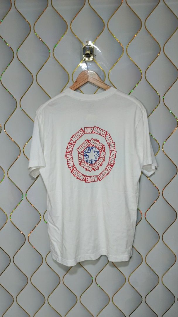 Uniqlo UT Marvel Captain America (Category: Tshirts & Polo Shirts ) located in Manila. Submitted by zariyah.1986 (Listing ID 1464756793, Image 2). Description: - Brand/Collection: Uniqlo UT x Marvel - Design: White tee with front red box logo and large Captain America shield back graphic (made of Marvel text logos) - Size: Medium - Condition: Excellent, clean fabric with no stains or damage - Style: Casual everyday wear, perfect for fans.