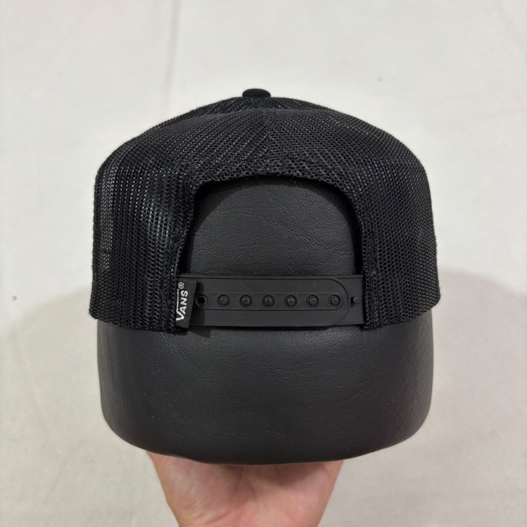 Vans Black Rose Trucker Hat (Category: Caps & Hats) located in Cavite. Submitted by itsayaaa (Listing ID 1464698997, Image 3). Description: - Brand: Vans - Color: Black with red and white embroidery - Design: Embroidered rose graphic with white outlined Vans logo on front - Features: Breathable mesh back panels and curved brim - Closure: Adjustable snapback for a custom fit - Condition: Brand new / Excellent.