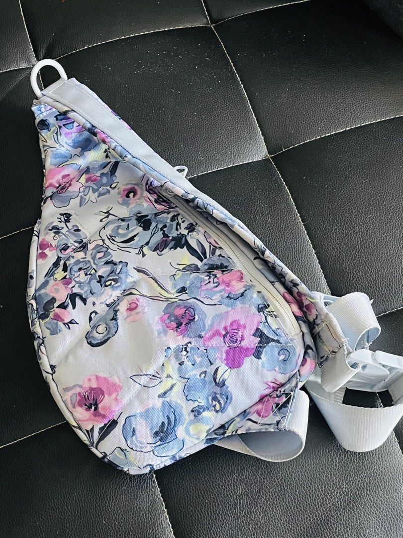 Vera Bradley Floral Sling Bag (Category: Cross-body Bags) located in Malolos. Submitted by magnoannchrstn (Listing ID 1464614291, Image 2). Description: - Adorable Vera Bradley sling bag - Charming floral print - Adjustable strap for comfort - Main zippered compartment for secure storage - Convenient front pocket - Features branded Vera Bradley zippers - Ideal for everyday errands or travel adventures.