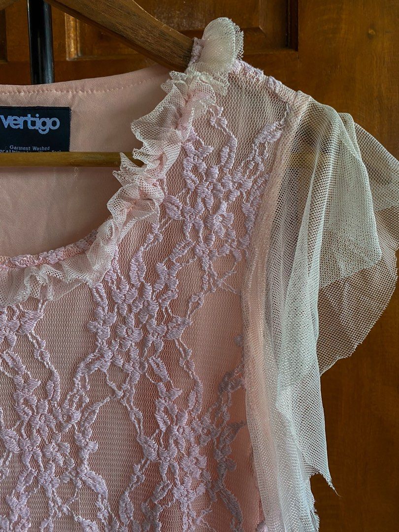Vertigo Pink Lace Ruffle Tulle Top (Category: Sleeveless) located in Legazpi City. Submitted by engr.i (Listing ID 1464587494, Image 3). Description: - XS-M - Cute pink top from Vertigo - Features lace overlay - Sheer tulle ruffles on sleeves and hem - Delicate ruffle on neckline - Sweet and feminine style - Great for layering or wearing alone.