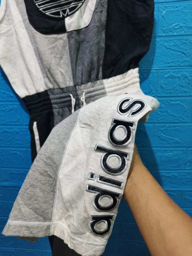 Vintage Adidas Patchwork Overalls Jumpsuit Size L (Category: Jumpsuits) located in Davao. Submitted by vndrgd (Listing ID 1464618158, Image 3). Description: - Cool Adidas patchwork overalls - Color block design: Grey, black, and white - Iconic trefoil logo on chest pocket and leg - Elasticated waistband with drawstring - Adjustable straps - Ideal for a casual, sporty look - Size: L.