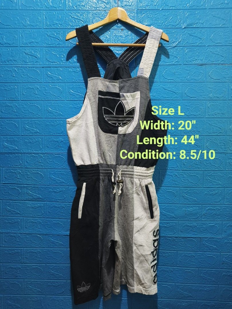 Vintage Adidas Patchwork Overalls Jumpsuit Size L (Category: Jumpsuits) located in Davao. Submitted by vndrgd (Listing ID 1464618158, Image 1). Description: - Cool Adidas patchwork overalls - Color block design: Grey, black, and white - Iconic trefoil logo on chest pocket and leg - Elasticated waistband with drawstring - Adjustable straps - Ideal for a casual, sporty look - Size: L.