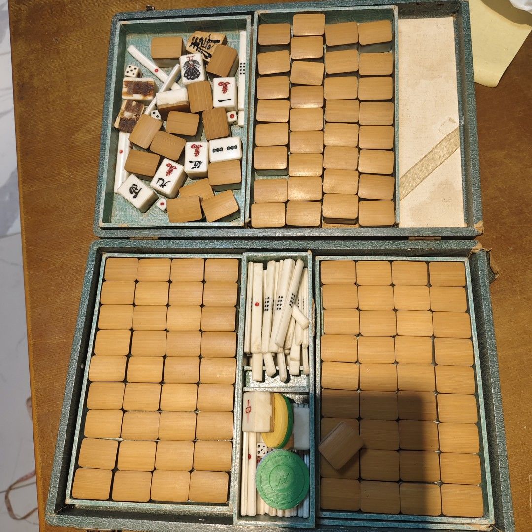 Vintage Bamboo Mahjong Set with Green Case (Category: Board Games & Puzzles) located in Bulacan. Submitted by babz30261 (Listing ID 1464692929, Image 1). Description: - Vintage complete mahjong set with authentic bamboo and bone tiles - Includes counting sticks, dice, and colorful gaming chips - Housed in a classic green textured carrying case with metal clasps - Beautiful natural patina showing lovely signs of age - Ready for family game nights 