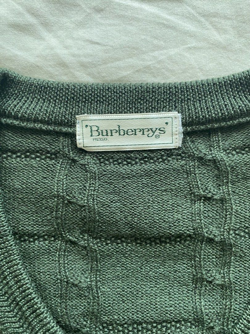 Vintage Burberrys V-Neck Sweater Wool (Category: Coats, Jackets and Outerwear) located in Quezon City. Submitted by johncarlo243098 (Listing ID 1462929617, Image 1). Description: Condition: has holes and stains .
