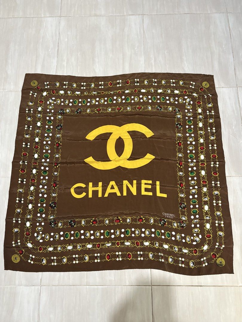 VINTAGE CHANEL PARIS SILK SCARF (Category: Luxury Accessories) located in Naga. Submitted by sislovesme (Listing ID 1464629105, Image 1). Description: •RARE COLORWAY •AUTHENTIC •NO FLAWS •W 34.5 INCHES •H 33 INCHES.