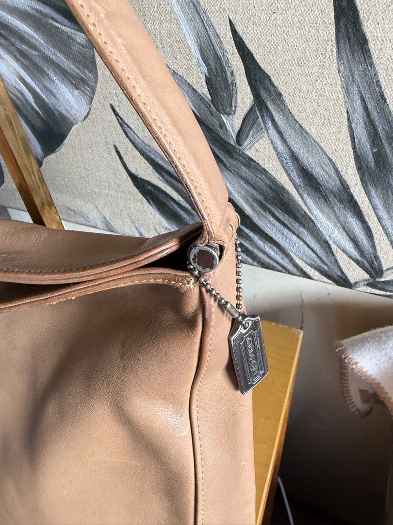 Vintage Coach Tan Leather Shoulder Bag (Category: Shoulder Bags) located in Quezon City. Submitted by good_finds_mnl (Listing ID 1464598883, Image 2). Description: Classic tan leather shoulder bag. Soft leather with a nice sheen. The strap is adjustable. Plenty of space inside for your essentials. A versatile bag for everyday use. Some minor scuffs on the leather from normal wear..