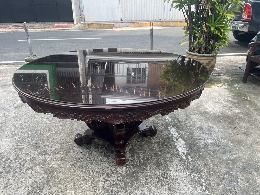 Vintage Narra Round Dining Table w/ Glass Top (Category: Tables & Sets) located in Makati City. Submitted by baliktanaw (Listing ID 1464600890, Image 1). Description: Vintage Round Dining Table Made of solid Narra wood Height: 30 inches Diameter: 59 3/4 inches.