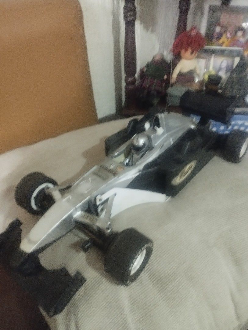 VINTAGE TOY CAR BIG SIZE (Category: Vehicle & Diecast Models) located in Mandaluyong City. Submitted by LEATHERFACE (Listing ID 1464580321, Image 1). Description: - Sleek, silver F1-style race car - Features black accents for a sporty look - Includes a driver figure inside - Ideal for both display and active play - Ready for its next owner!.