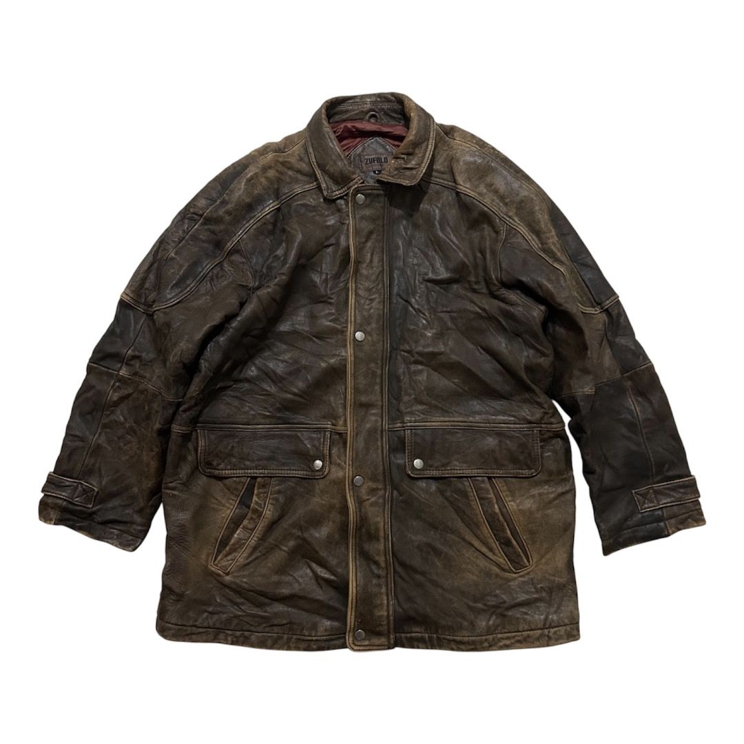 Vintage Zufulo Brown Leather Jacket (Category: Coats, Jackets and Outerwear) located in Sorsogon. Submitted by wayne.japon (Listing ID 1464661452, Image 1). Description: - Classic brown leather jacket with a distressed finish. - Two front pockets with button closures. - Button cuffs on sleeves. - Perfect for achieving a rugged aesthetic. Vintage Zufulo Japan Leather Jacket Good condition Leather 24x32 XL Issue on picture 350.