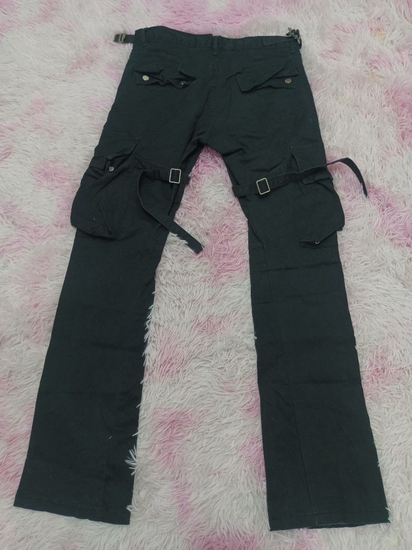 Vuja Dé Black Cargo Pants with Straps (Category: Announcements) located in Jolo. Submitted by zah-zah (Listing ID 1464747083, Image 2). Description: - Brand/Model: Vuja Dé Black Cargo Pants - Material: Heavyweight cotton for durable, solid construction - Fit: Straight leg fit, ideal for daily streetwear rotation - Details: Adjustable side buckle straps at waist and thighs - Pockets: Multiple utility pockets on legs and back - Closure: Classic but