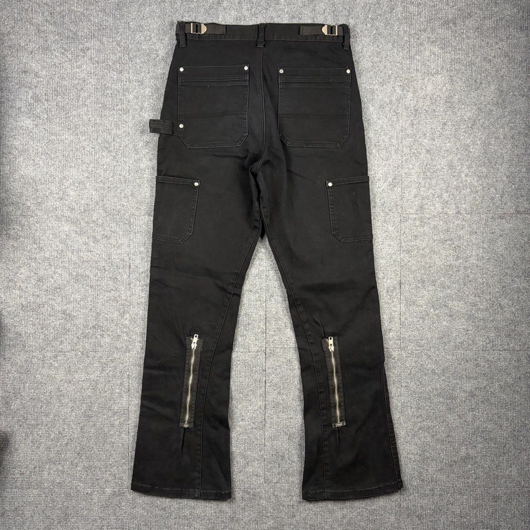 Vuja De Flared Black Zip Double Knee Carpenter Pants (Category: Jeans) located in Manila. Submitted by yourtherapist_ (Listing ID 1464713012, Image 2). Description: Vuja De Flared Black Zip Double Knee Carpenter Pants Size: S Condition: Excellent Flaw: Zipper mark fade (unnoticeable) Material: 95% Cotton, 5% Ployurethane Made in: Japan Measurements Waist: 30 Length: 40 Hem: 8.5 Front Rise: 12 Thigh: 10.5 7,000.