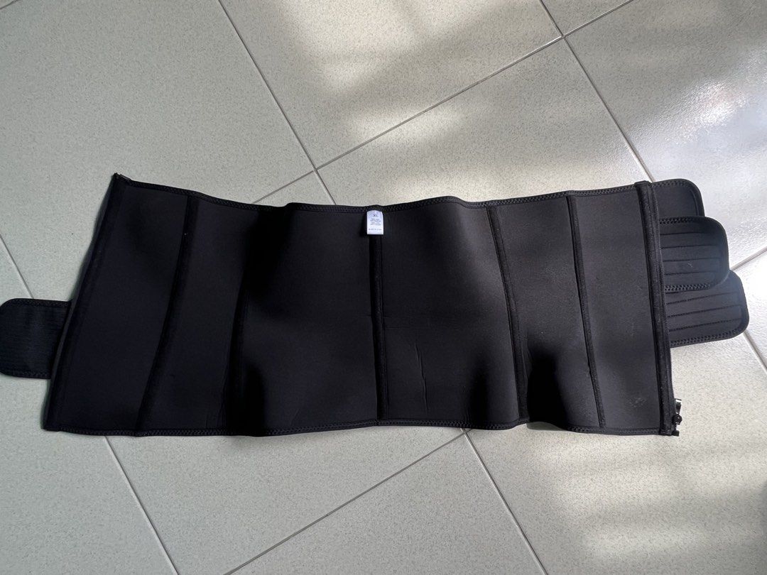 Waist Trainer Belt (Category: Activewear) located in Batangas. Submitted by alaisaampa7513 (Listing ID 1464575670, Image 3). Description: - Brand: Lover-Beauty - Color: Black - Size: XL - Feature: Zipper + Adjustable velcro straps for a snug fit - Benefits: Helps with posture and waist shaping - Usage: Great for workouts or everyday wear - Qualities: Comfortable and effective.
