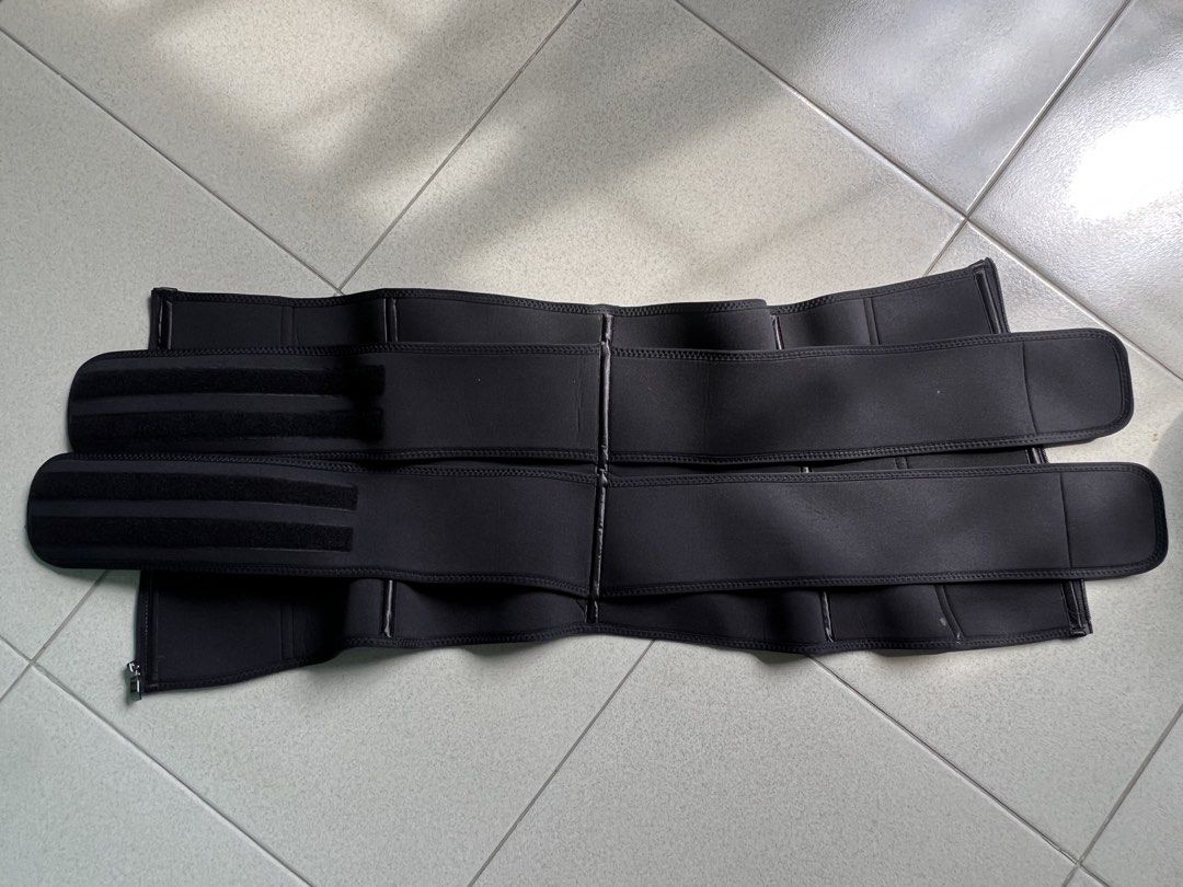 Waist Trainer Belt (Category: Activewear) located in Batangas. Submitted by alaisaampa7513 (Listing ID 1464575670, Image 2). Description: - Brand: Lover-Beauty - Color: Black - Size: XL - Feature: Zipper + Adjustable velcro straps for a snug fit - Benefits: Helps with posture and waist shaping - Usage: Great for workouts or everyday wear - Qualities: Comfortable and effective.