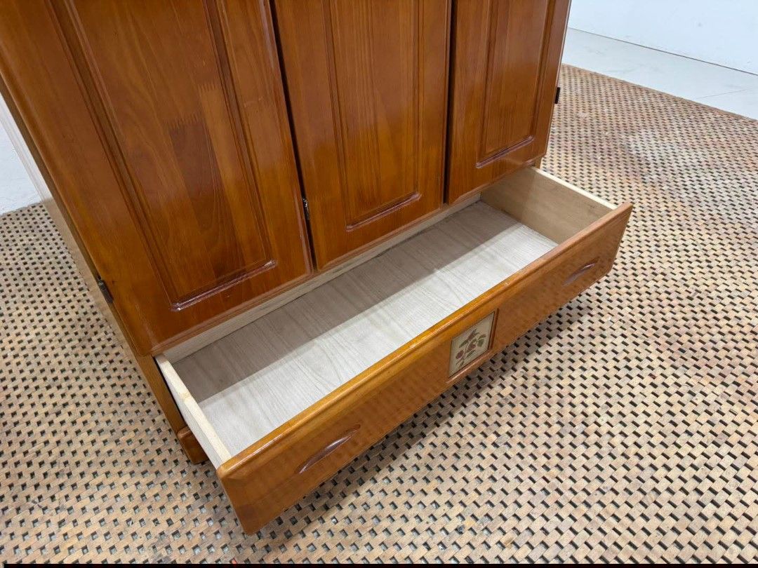 Wardrobe (Category: Shelves, Cabinets & Racks) located in Meycauayan. Submitted by marygracecasimiro (Listing ID 1464651005, Image 3). Description: Wooden 3-Door Wardrobe with a Drawer Price: 14,500 L35.5 x W23 x H70 In good condition💜💜.