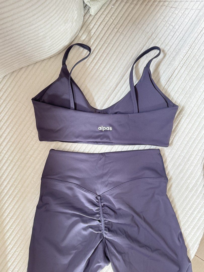 Wear Alpas Demi Set (Slate Gray) (Category: Activewear) located in Dasmarinas. Submitted by ella.i2 (Listing ID 1464623786, Image 2). Description: - Used twice - Bought for ₱3,600 - Looks more like a Dusty Blue than Slate Gray - Bra: V-neckline, thin straps - Leggings: Flare style, ruched back detail, V-waistband - Versatile: Ideal for workouts or casual wear - Features: Comfortable and stylish design 📍Dasma.