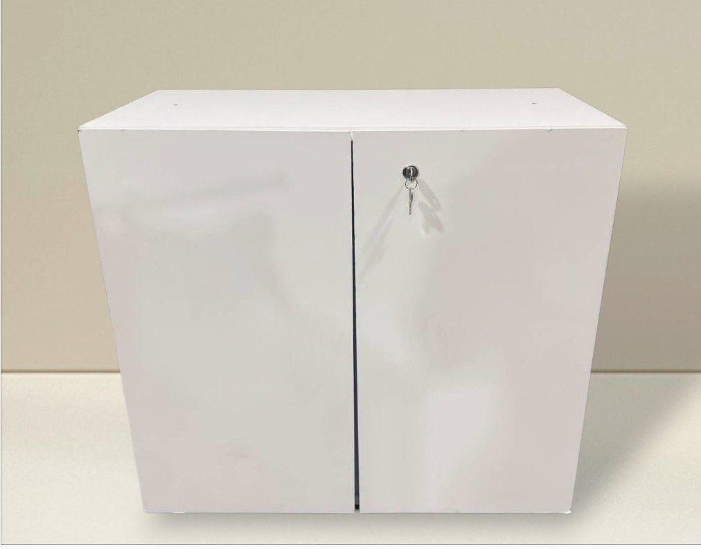 White 2-Door Side Storage Cabinet with Lock (Category: Shelves, Cabinets & Racks) located in Quezon City. Submitted by dannikkishoppe2 (Listing ID 1464706062, Image 1). Description: White 2-Door Side Storage Cabinet with Lock ‼️₱3500‼️ • Color/Finish: Clean solid white • Storage: Two doors with adjustable shelves • Security: Includes working lock and keys • Dimensions: 31.5" (W) x 16.5" (D) x 29" (H) • Condition: Sturdy build, ready to use • Vers