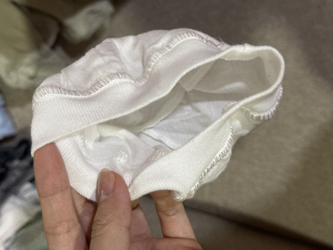 White Cotton Newborn Hat (Category: Hats & Beanies) located in Cebu City. Submitted by jillianmariebascones (Listing ID 1464691776, Image 2). Description: - Classic white newborn hat - Made from soft cotton material - Features an elasticated band for a comfortable fit - Versatile for everyday styling - Easy to pair with various outfits.