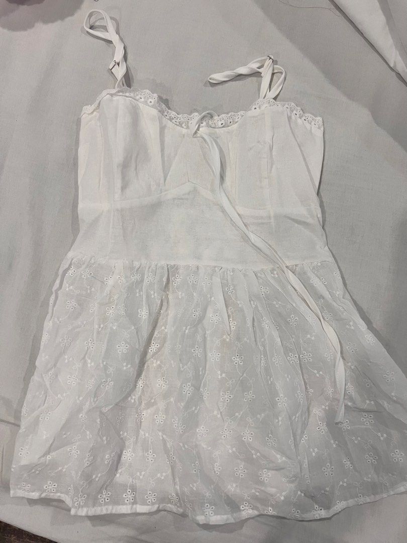 White Eyelet Lace Top with Tie (Category: Sleeveless) located in Quezon City. Submitted by aamnda (Listing ID 1464717713, Image 1). Description: - from bangkok - never used but no tag anymore.
