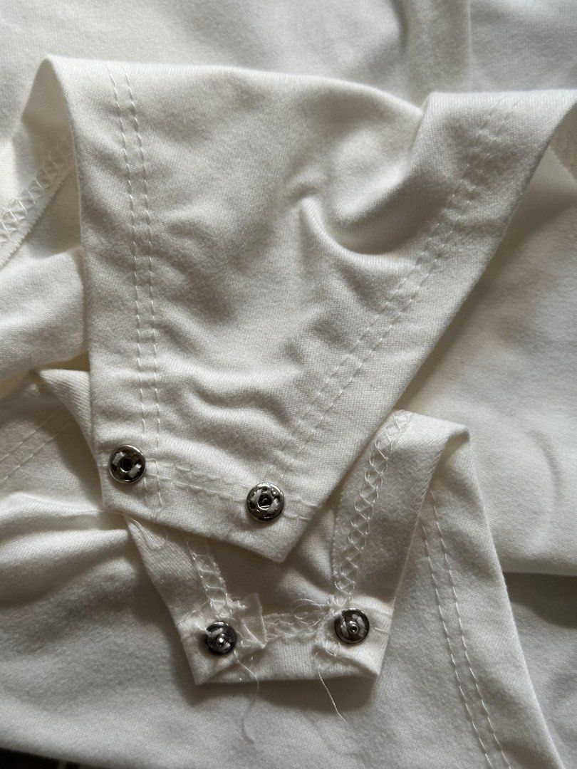 White Halter Body Suit (Category: Sleeveless) located in Paranaque City. Submitted by preloveeed890 (Listing ID 1464670591, Image 2). Description: thin fabric.