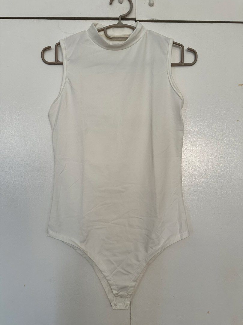White Halter Body Suit (Category: Sleeveless) located in Paranaque City. Submitted by preloveeed890 (Listing ID 1464670591, Image 1). Description: thin fabric.