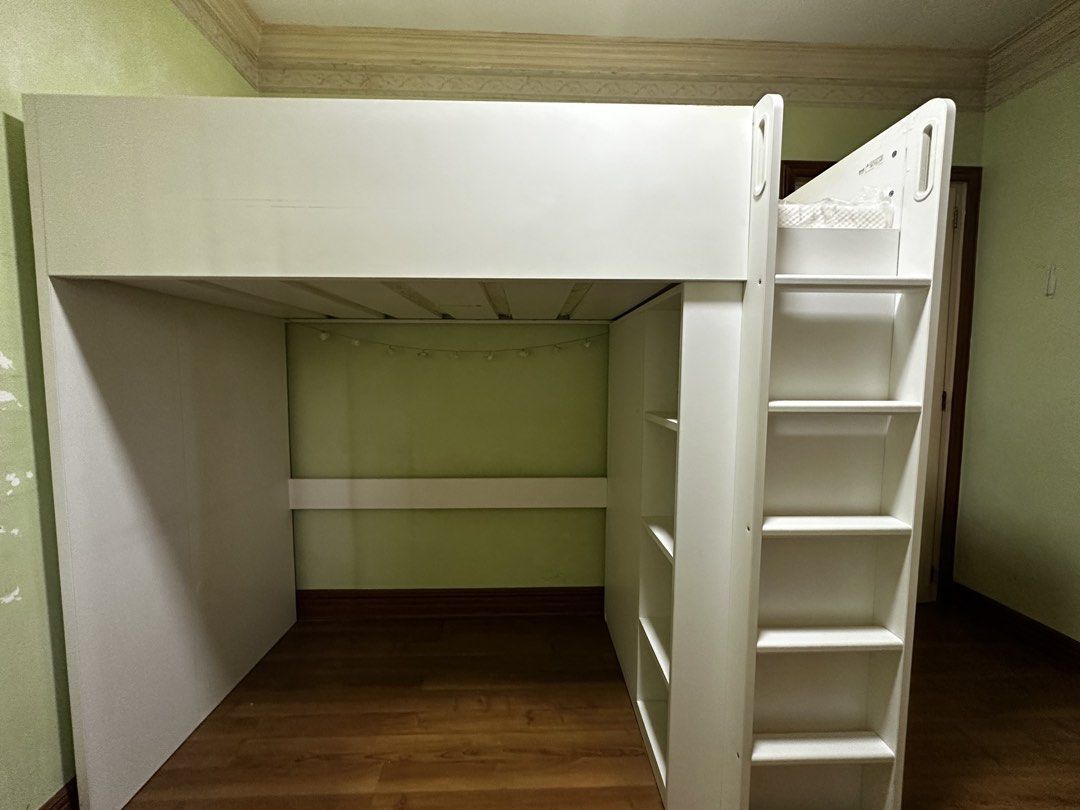 White IKEA Loft Bed with Wardrobe and Shelves (Category: Bed Frames & Mattresses) located in Quezon City. Submitted by migsu126 (Listing ID 1464582089, Image 1). Description: White IKEA Bunk Bed - With New Mattress - Negotiable - For Pick Up Only - Buyer needs to disassemble to bring it out.