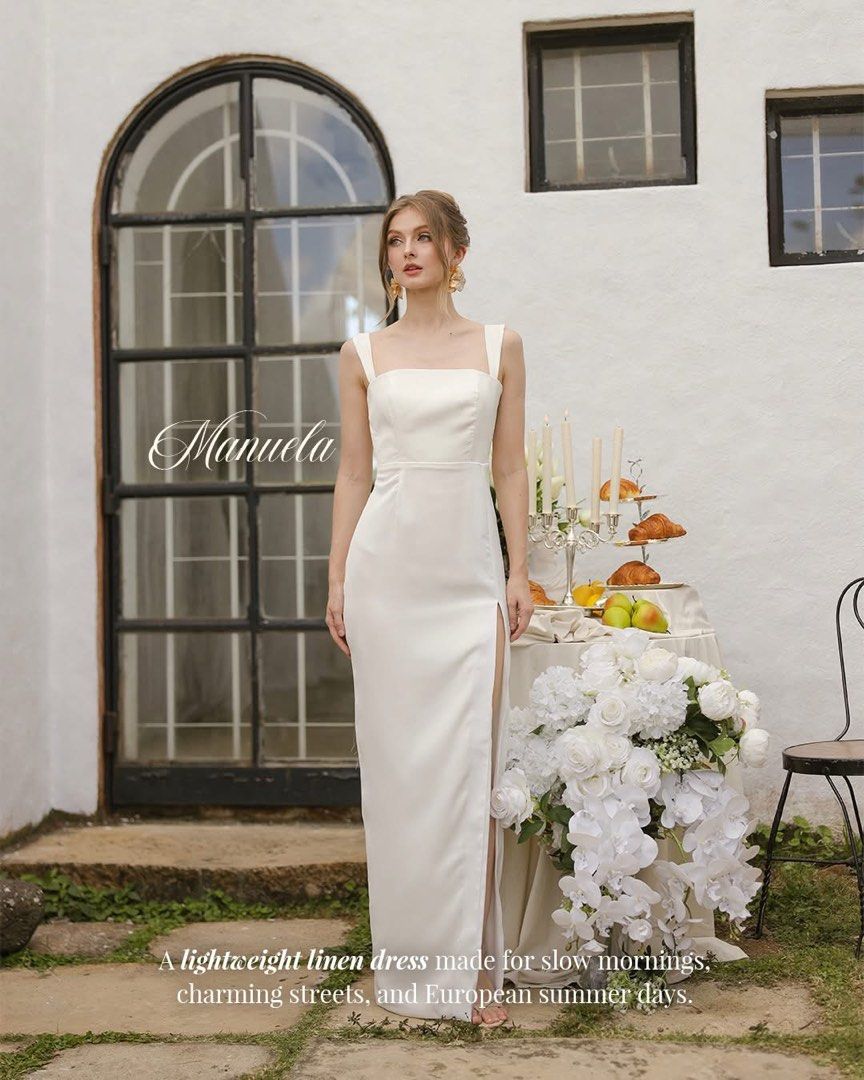 White long dress (Category: Dresses) located in Bacoor. Submitted by nicole_1818 (Listing ID 1464620320, Image 1). Description: 🤍 FOR SALE: MANUELA DRESS 🤍 ✨ MANUELA Strappy Straight Cut Maxi with Slit Color: White Fabric: Silk Crepe Size: Medium (M) 📌 Condition: Brand New / Never Worn Reason for selling: Hindi ko naisuot kasi late dumating. Perfect for pre-wedding, reception, civil wedding, prenup, bridesmaid, or special occasions. 🤍✨ 📍 Loc