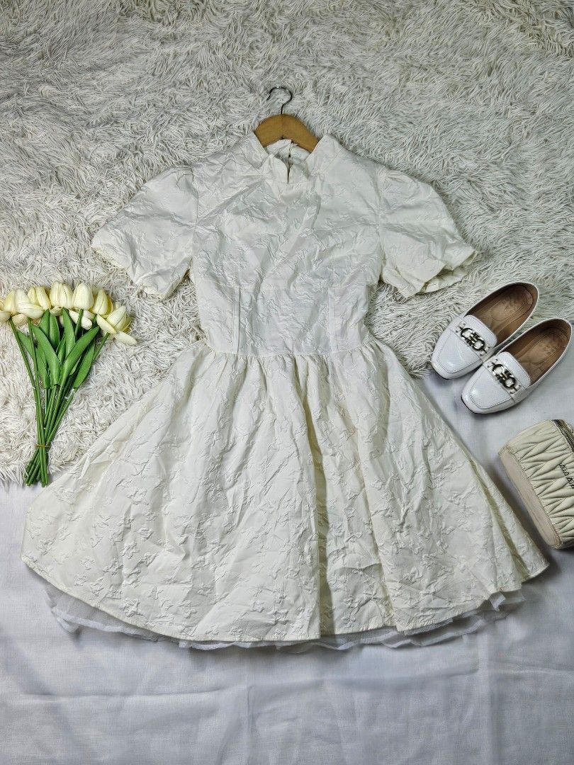 White mini dress (Category: Dresses) located in Pandi. Submitted by delacruz_ar (Listing ID 1464634449, Image 1). Description: Cutesy Vietnam dress.