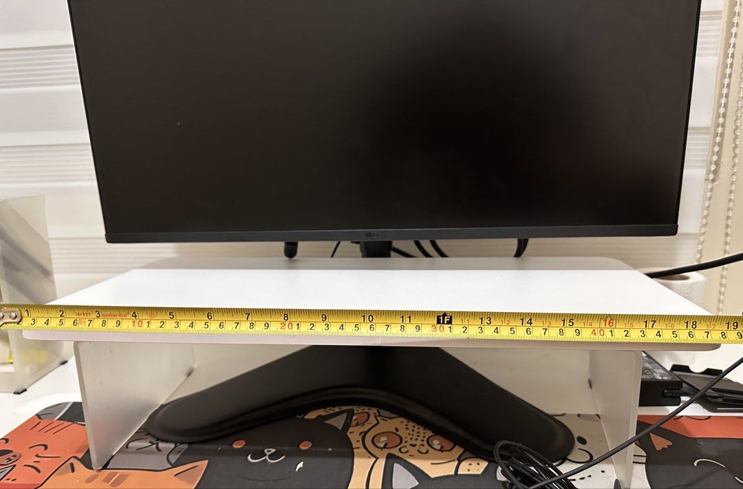 White Monitor Stand /Riser (Category: Office Furniture & Fixtures) located in Caloocan City. Submitted by marianne_t.58 (Listing ID 1464639275, Image 2). Description: - White monitor stand for a cleaner workspace. - Creates valuable extra desk space. - Helps organize your desk and reduce clutter. - Fits most standard monitors. - Sturdy and durable build (made out of wood and durable plastic stands) - Dimensions: Approximately 19 inches (length) x