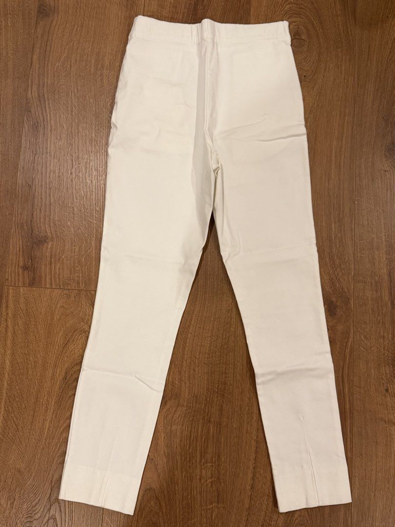 White pants (Category: Other Bottoms) located in Paranaque City. Submitted by bbyooodaa (Listing ID 1464642080, Image 1). Description: Skinny pants with garter Only worn once or twice! Super cute! .