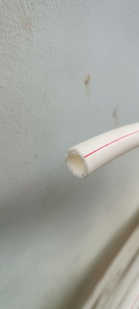 White Plastic Piping with Red Stripe (Category: Construction & Building Materials) located in Marikina City. Submitted by grandwind.1d6ce4 (Listing ID 1464583996, Image 3). Description: FOR SALE: PPR Pipe 1/2" (20mm) - TAKE ALL ONLY Details: • Size: 1/2" (20mm) PPR Pipe, puti with red line • Condition: Brand New, never nagamit (nabasa lang, nalinis na) • Haba: 36 loops, approx 90-100 meters, naka-roll as is Price: ₱13,000 take all only - hindi po