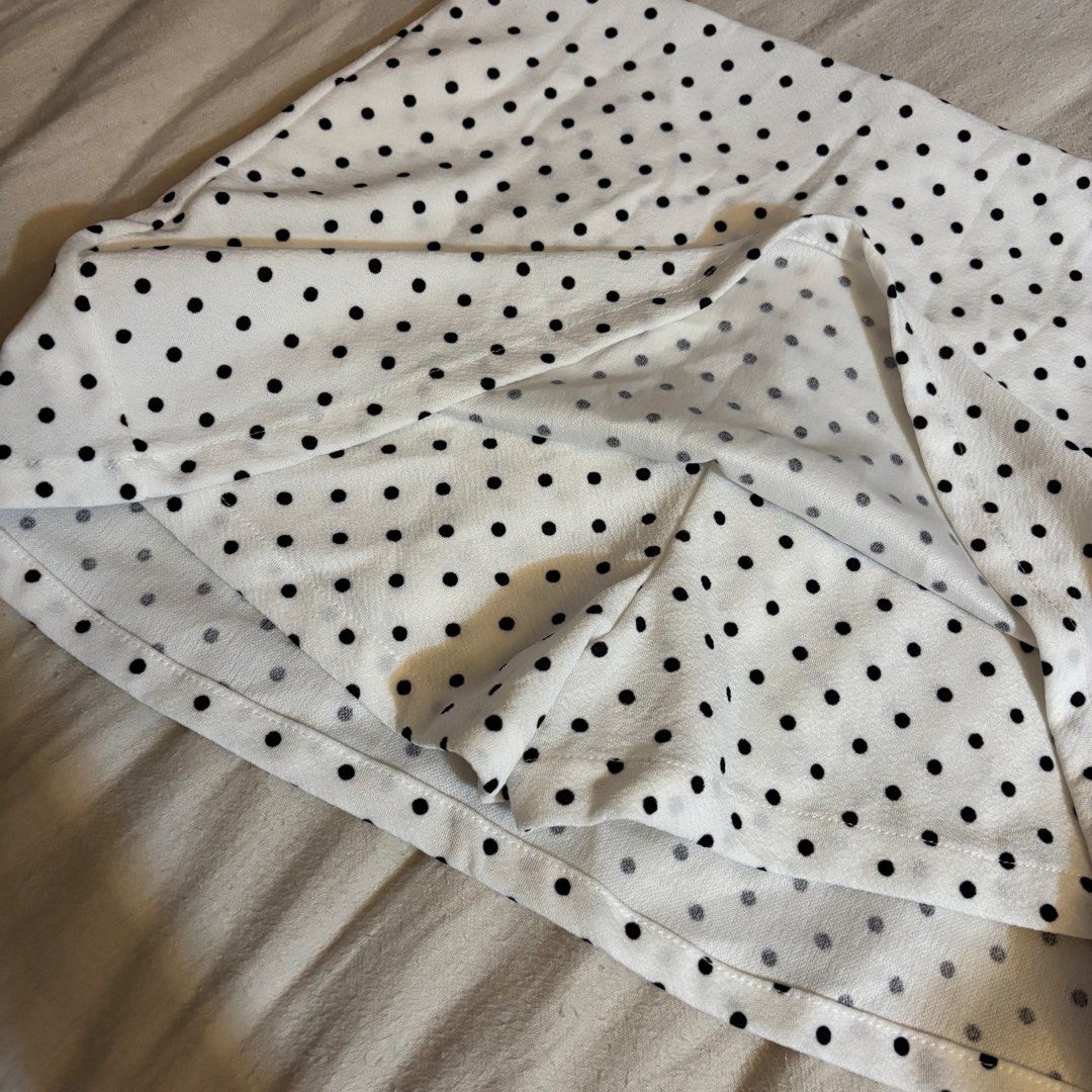 White Polka Dot Mini Skirt (Category: Skirts) located in Cainta. Submitted by kairus.luckyfind (Listing ID 1464656651, Image 2). Description: - Cute white mini skirt - All-over black polka dot pattern - Simple A-line cut - Lightweight material - Versatile for casual or dressed-up outfits - Easy to pair with various tops.