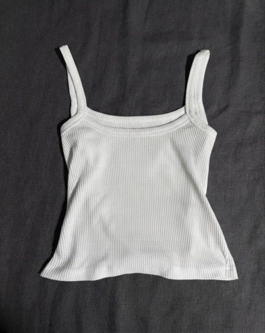 White Ribbed Square Neck Tank Top (Category: Sleeveless) located in Manila. Submitted by glossywife (Listing ID 1464602995, Image 1). Description: Used once only Quality is so nice! So cute, similar to Aritzia! Mop: GCash / Bank Transfer Mod: GrabExpress / J&T / Lalamove Brandy Melville Zara Isa the label H&M Cotton On Stradivarius Phia Hollister Subdued John Galt Miu the label Traje Linen Bershka Aritzia Princess Polly Free People Realisation Pa