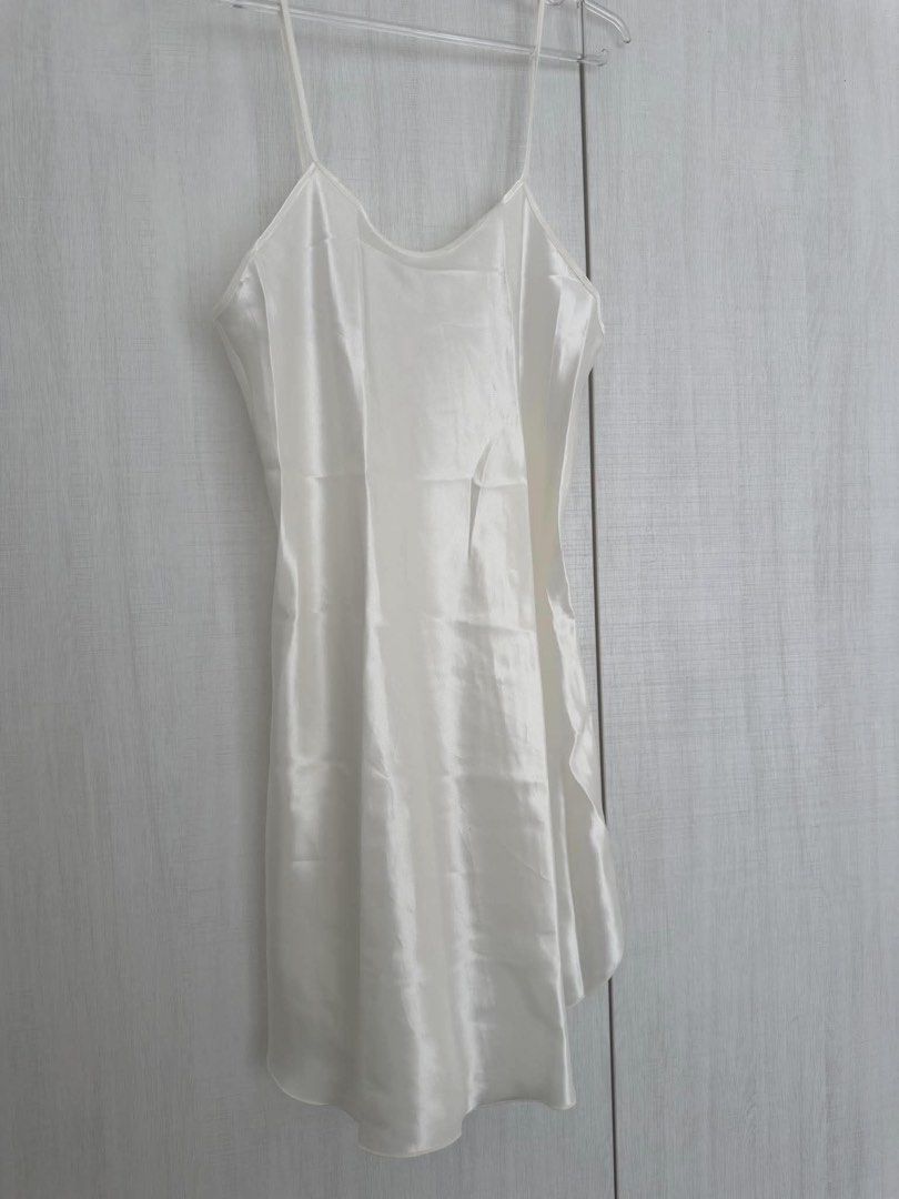 White Satin Slip Nightgown (Category: Undergarments & Loungewear) located in Cainta. Submitted by kairus.luckyfind (Listing ID 1464625749, Image 1). Description: FITS S-M - Elegant white satin slip nightgown - Thin spaghetti straps - Flattering V-neckline in front - Chic low scoop back - Silky smooth and comfortable material - Perfect for sleeping or lounging - Estimated size: Small to Medium.