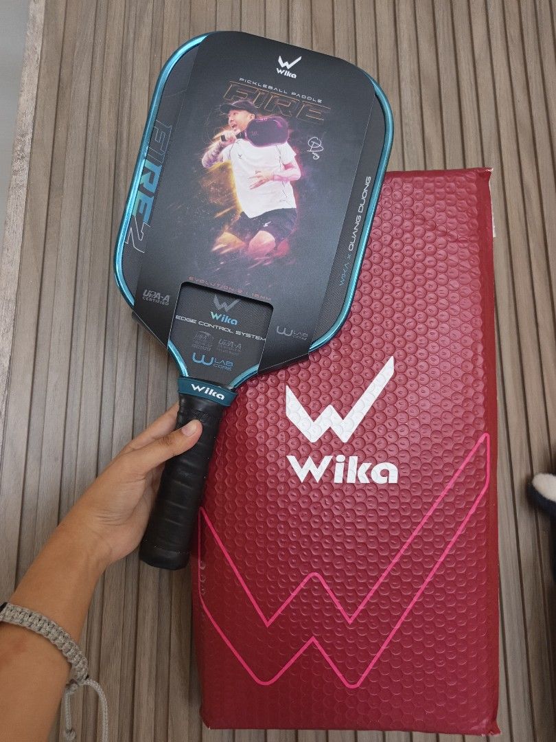 Wika Fire 2 Pickleball Paddle (Category: Racket and Ball Sports) located in Nabunturan. Submitted by Xenonshop (Listing ID 1464586587, Image 3). Description: - Wika QD Fire 2 pickleball paddle - Collaboration with Quang Duong - Features Edge Control System for enhanced stability - Utilizes W-Lab technology for superior performance - Designed for excellent control and balance - Perfect for your next pickleball match -Used only for days since Septe